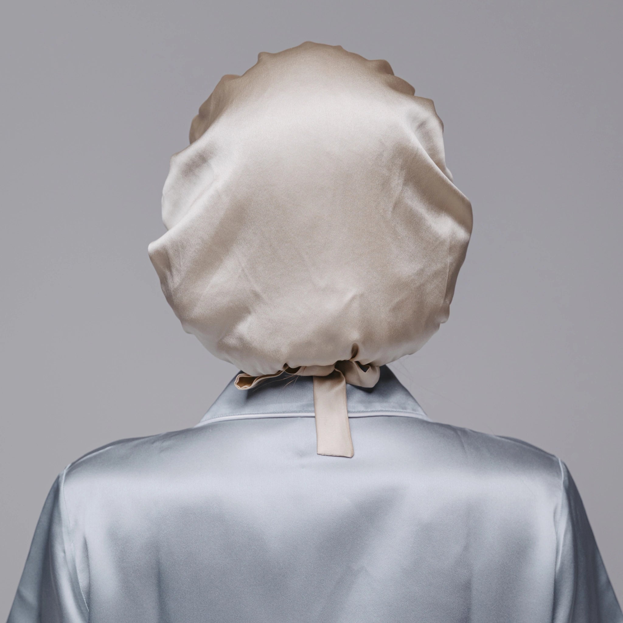 šilkinė kepurė šampaninė