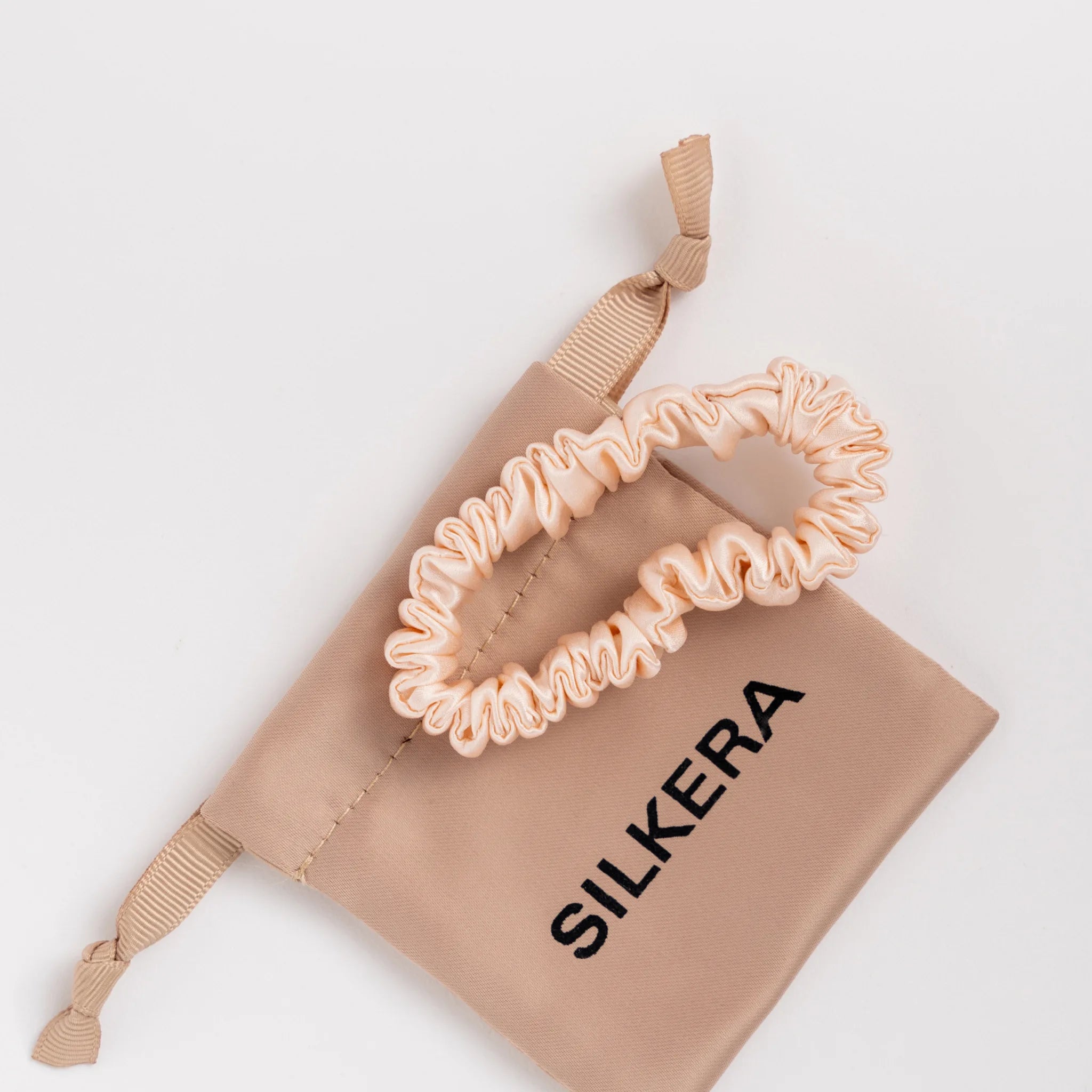 Rožinė plaukų gumytė