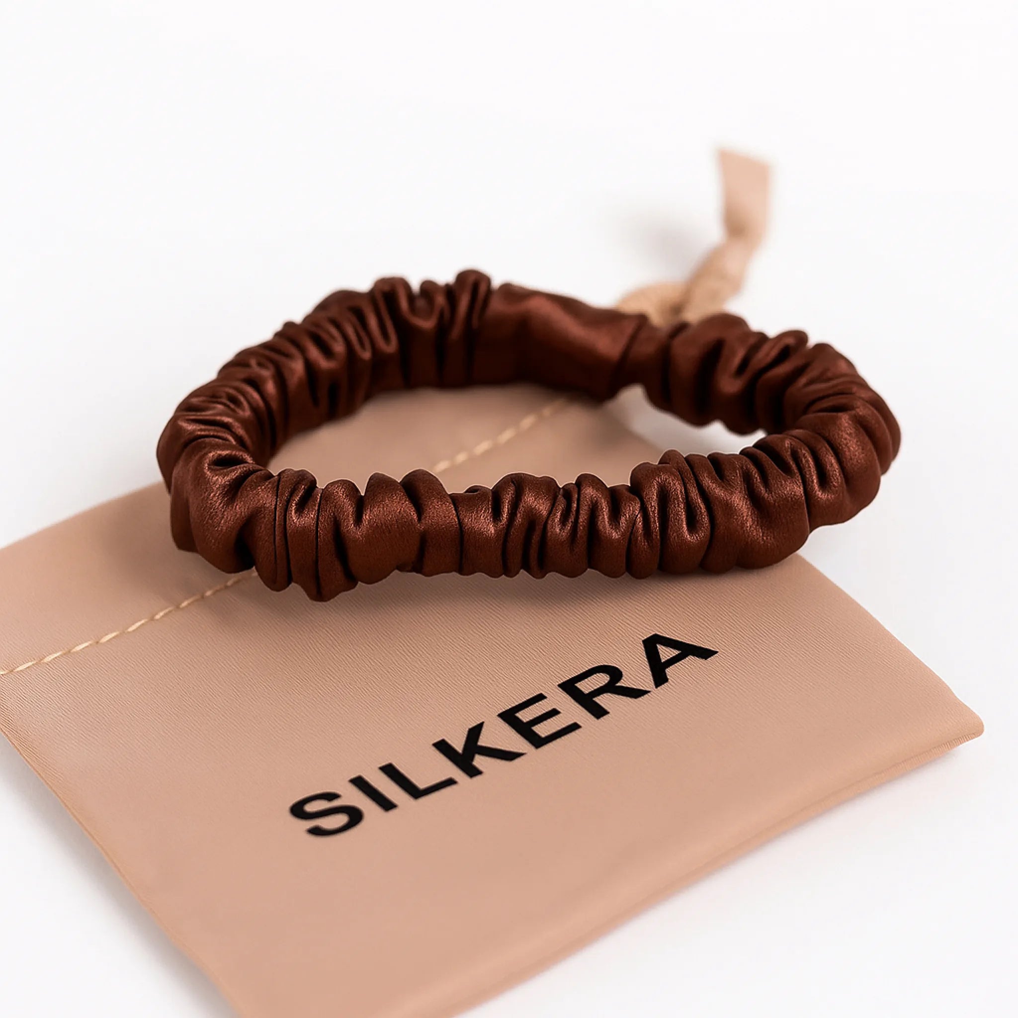 Ruda šilkinė plaukų gumytė