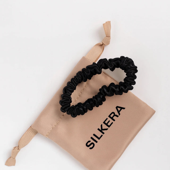 Silkine plauku gumyte maza juoda