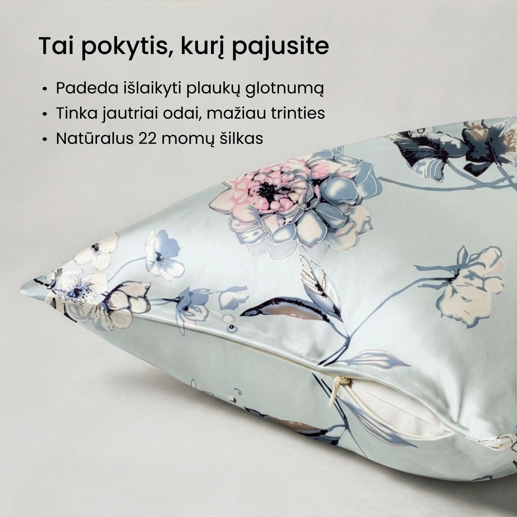Atspausdintas gėlių raštas ant šilkinio pagalvės užvalkalo