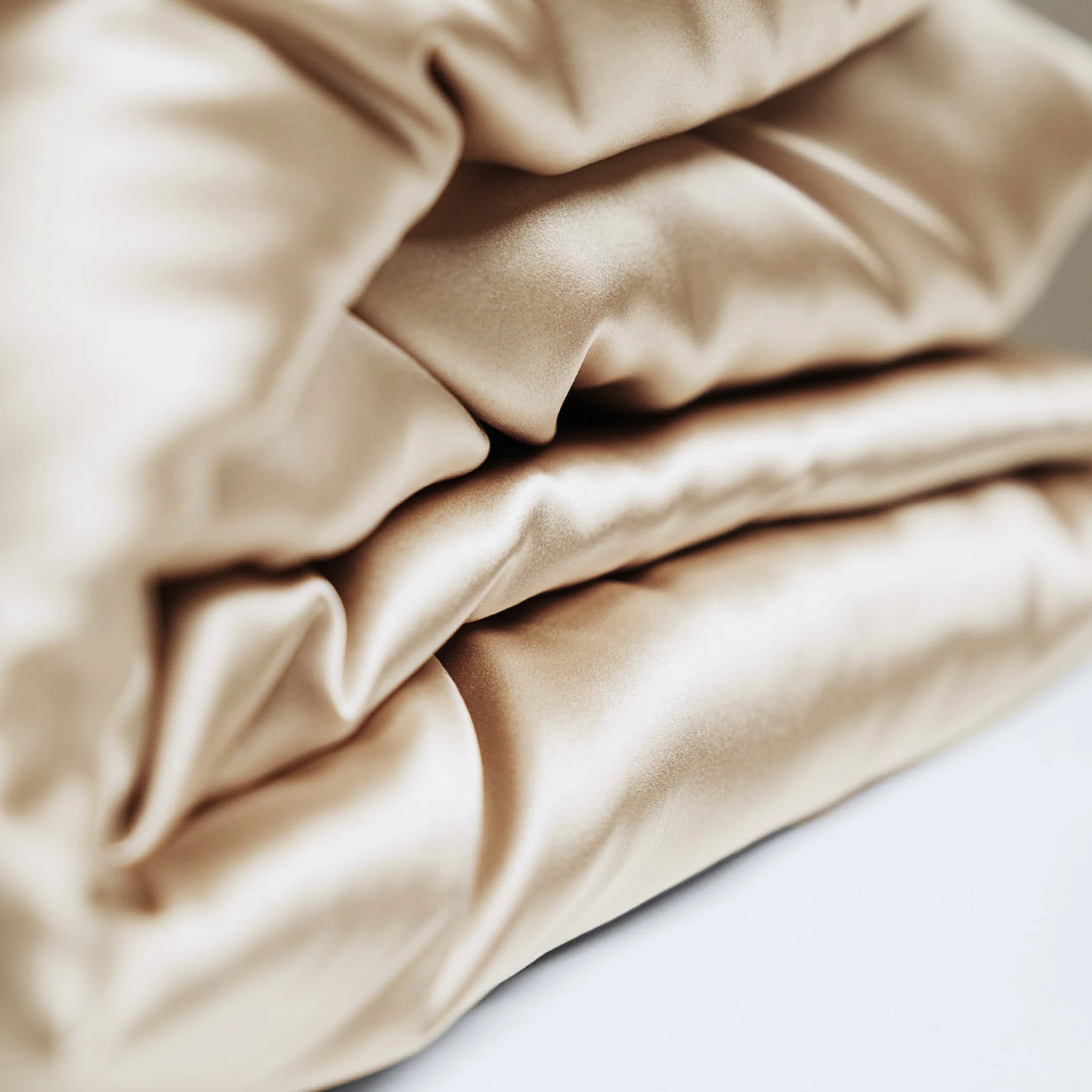 ŠILKINIS ANTKLODĖS UŽVAKALAS ŠAMPANINĖS SPALVOS